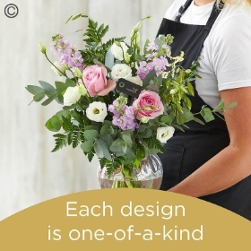 Vase arrangement made with seasonal flowers 2